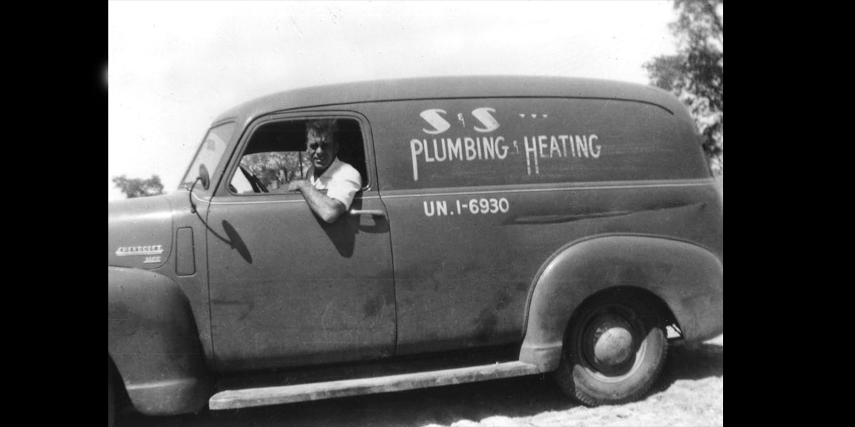 Image of old car with S & S Plumbing on the side